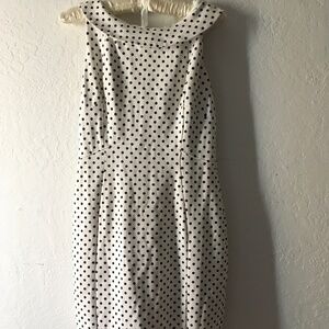 Size Small, White with navy polka dots